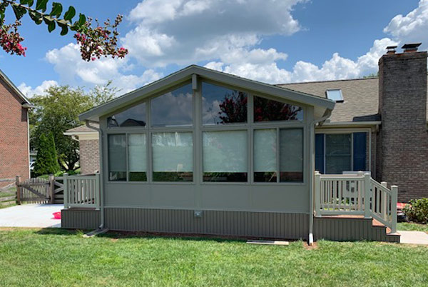 A three-season sunroom with materials provided by Central Maryland Sunrooms, a sunroom contractor.