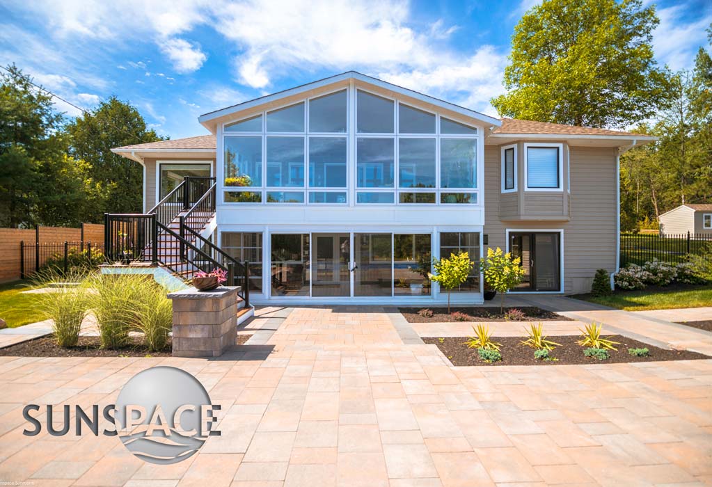 a two story sunroom addition with sunspace doors. WeatherMaster vinyl windows and Sunspace sunroom installation by Central Maryland Sunrooms in Maryland